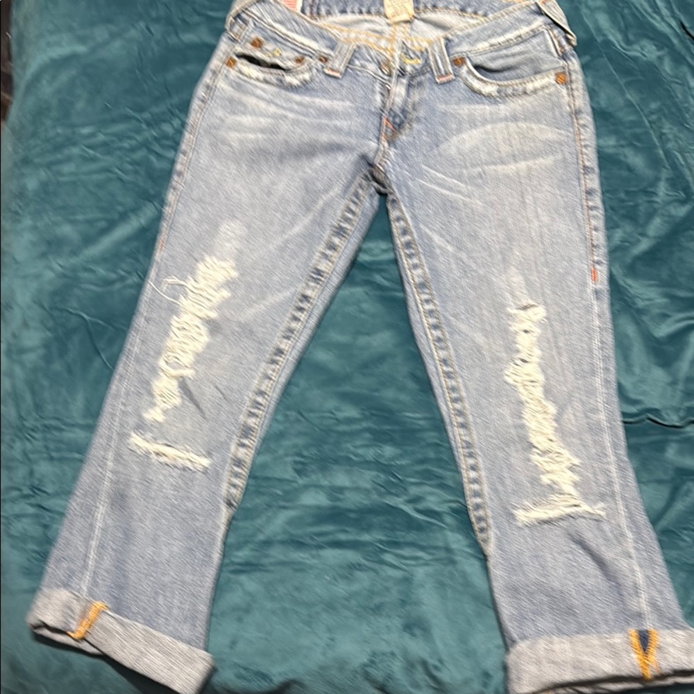 Women's Distressed Blue Jeans
